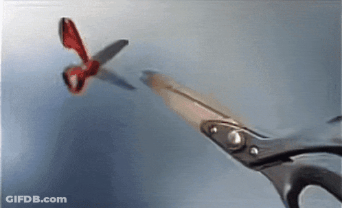 Woman In Suit And Tie With Poop On Jacket GIF