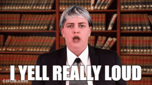 Woman In Suit And Tie Yelling GIF