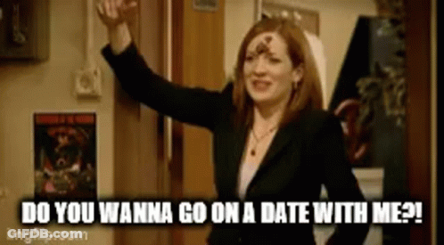 Woman In Suit Asking For A Date GIF