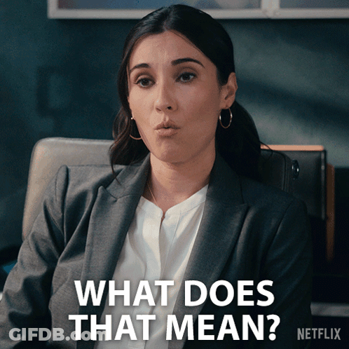 Woman In Suit Asking What Does That Mean On Netflix GIF