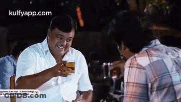 Woman In Suit Drinking Bottle Saying I Guess You Should Not Drink GIF
