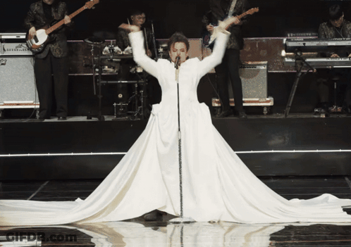 Woman In Suit Holding Cheese Sweet Dreams Are Made Of Cheese GIF