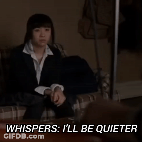Woman In Suit Saying I'll Be Quieter GIF