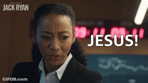 Woman In Suit Saying Jesus GIF