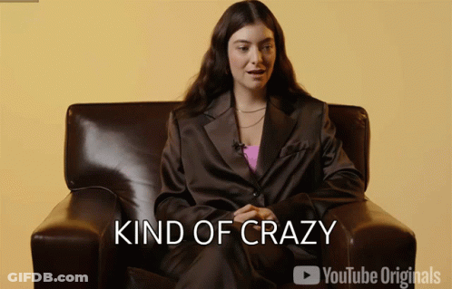 Woman In Suit Saying Kind Of Crazy GIF