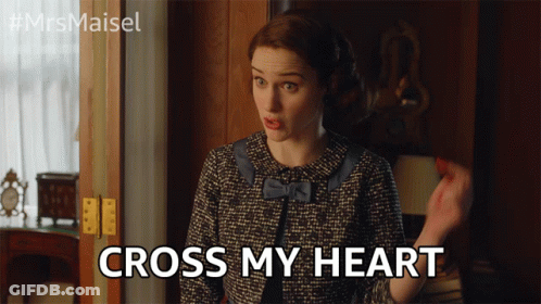 Woman In Suit Says Cross My Heart GIF