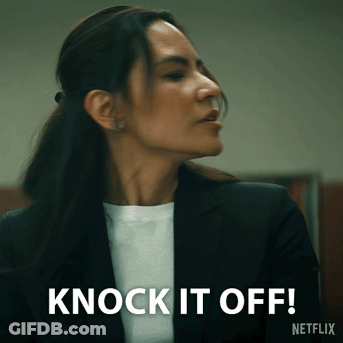 Woman In Suit Says Knock It Off Netflix Ad GIF