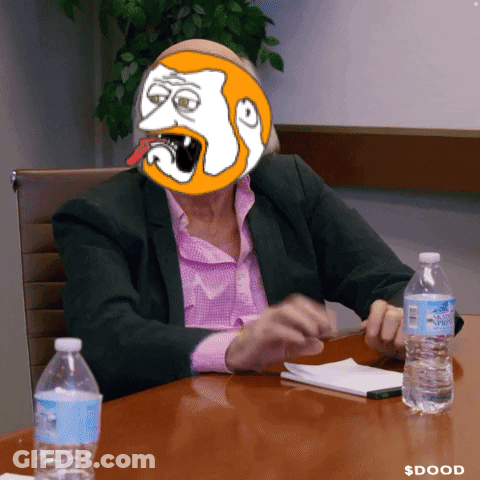 Woman In Suit Sitting At Table With Water GIF