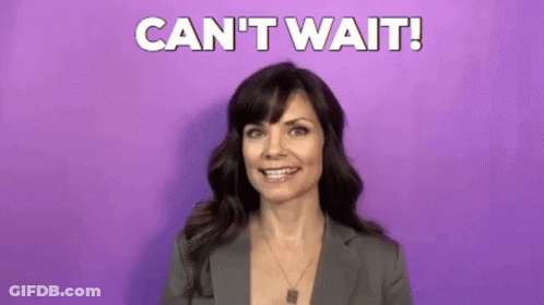 Woman In Suit Smiling Saying Cant Wait GIF