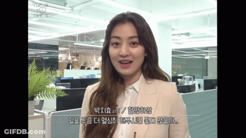 Woman In Suit Standing In Office GIF
