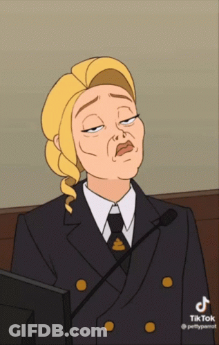 Woman In Suit With Poop On Jacket GIF