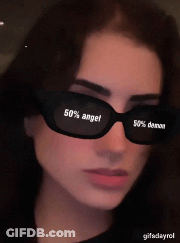 Woman In Sunglasses 50% Angel 50% Demon GIF