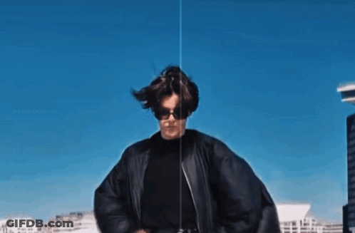 Woman In Sunglasses And Black Jacket Dancing GIF