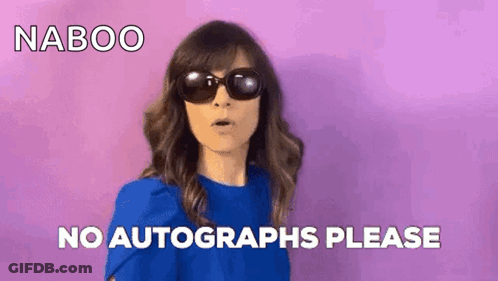 Woman In Sunglasses And Blue Shirt Saying No Autographs Please GIF