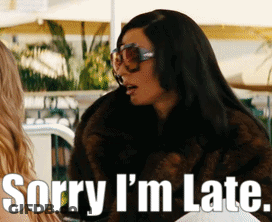 Woman In Sunglasses And Fur Coat Says Sorry I'm Late GIF