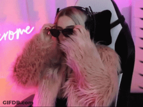 Woman In Sunglasses And Fur Coat Sitting GIF