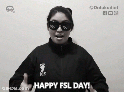 Woman In Sunglasses And ICS Jacket Says Happy FSL Day GIF
