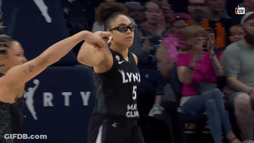 Woman In Sunglasses And Lynx Mayo Clinic Jersey GIF