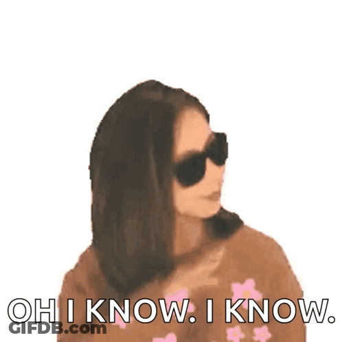 Woman In Sunglasses And Pink Flower Sweater Saying Oh I Know GIF