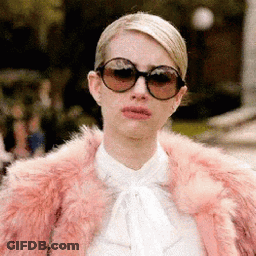 Woman In Sunglasses And Pink Fur Coat GIF