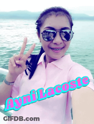 Woman In Sunglasses And Pink Shirt Aynilacoste GIF