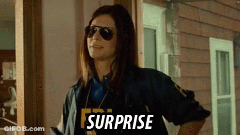 Woman In Sunglasses And Police Uniform Saying Surprise GIF