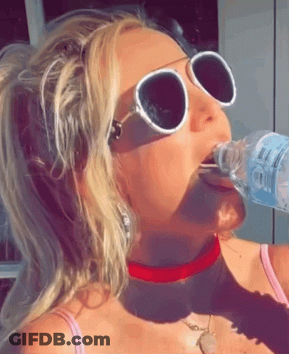 Woman In Sunglasses And Red Choker Drinking Water GIF