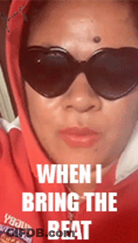 Woman In Sunglasses And Red Hoodie Saying When I Bring The Beat GIF