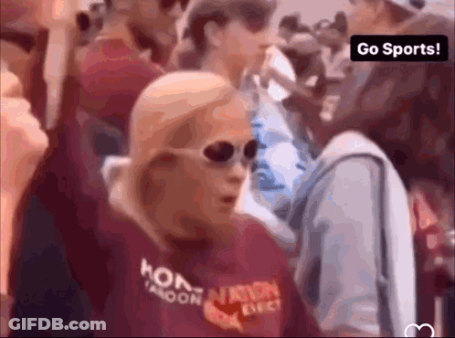 Woman In Sunglasses And Red Shirt Saying Hon Taroon GIF