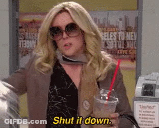 Woman In Sunglasses And Scarf Saying Shut It Down GIF