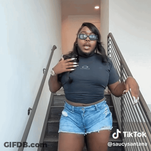Woman In Sunglasses And Shorts On Stairs TikTok GIF