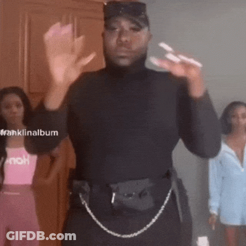 Woman In Sunglasses And Shorts On Stairs With TikTok Watermark GIF