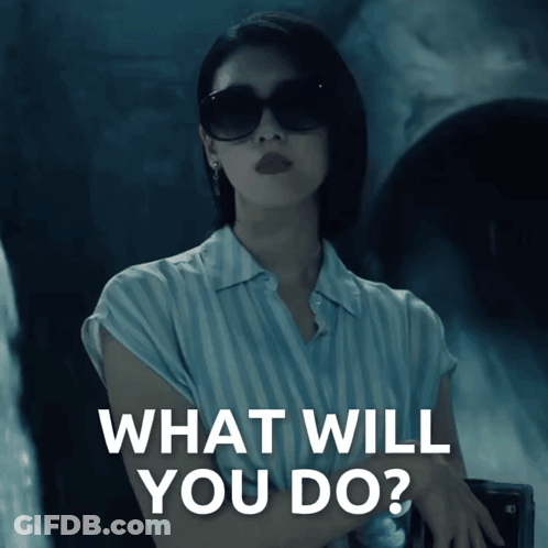 Woman In Sunglasses And Striped Shirt Saying What Will You Do GIF