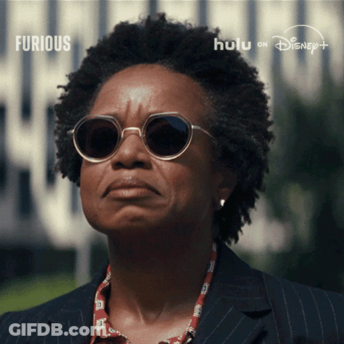 Woman In Sunglasses And Suit For Furious On Hulu GIF