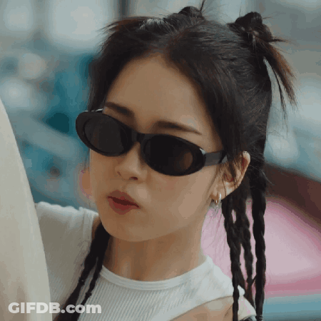 Woman In Sunglasses And White Shirt GIF