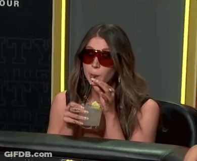 Woman In Sunglasses Drinking With Straw GIF