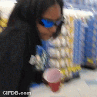 Woman In Sunglasses Holding Cup GIF