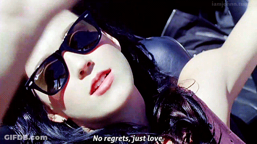 Woman In Sunglasses Laying Down Says No Regrets Just Love GIF