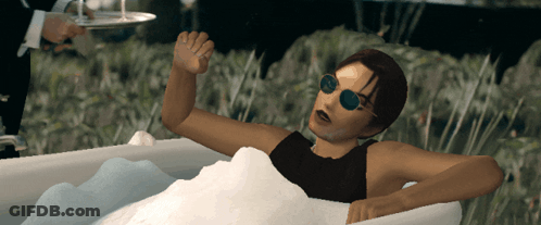 Woman In Sunglasses Laying In Bathtub With Foam GIF