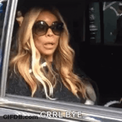 Woman In Sunglasses Mouth Open In Car GIF