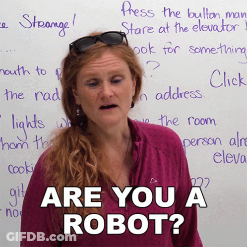 Woman In Sunglasses Says Are You A Robot GIF