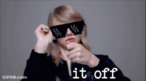 Woman In Sunglasses Shake It Off GIF