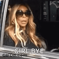 Woman In Sunglasses Sitting In Car GIF