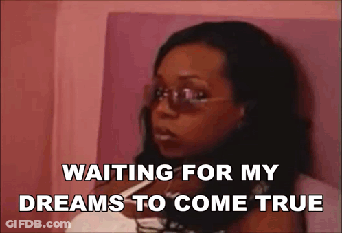 Woman In Sunglasses Sitting On Bed Waiting For Dreams GIF