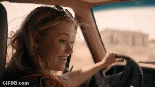 Woman In Sunglasses Smiling Driving GIF