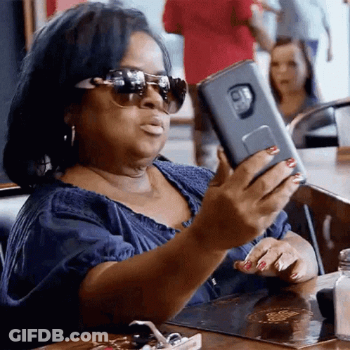 Woman In Sunglasses Taking Selfie GIF