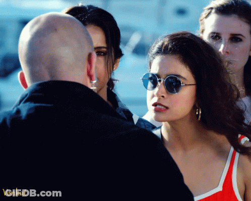 Woman In Sunglasses Talking To Bald Man Venkat GIF