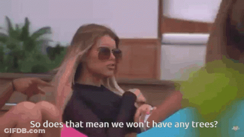 Woman In Sunglasses Talking To Man, Another Watches GIF