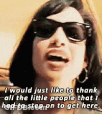Woman In Sunglasses Thanking Little People GIF