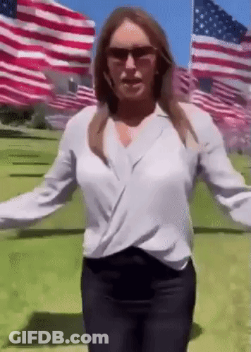 Woman In Sunglasses With American Flags GIF